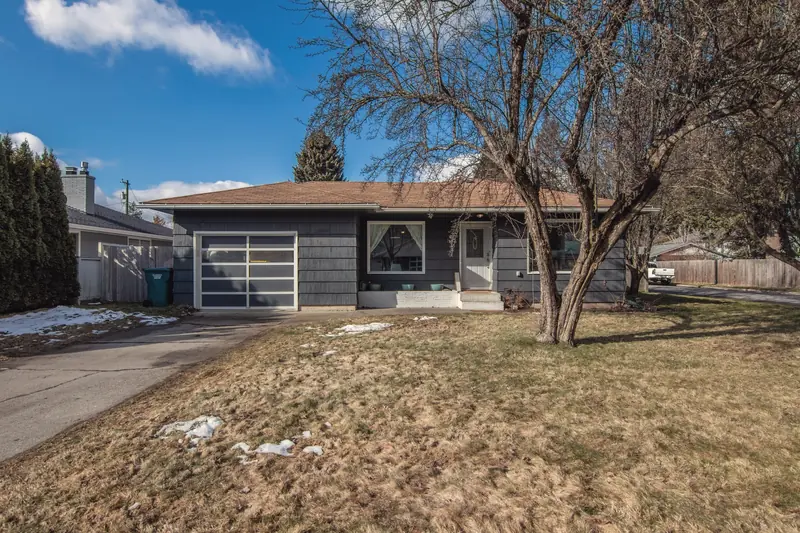 Front lawn of a single-story house in late winter